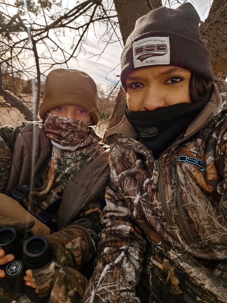 Mason hunting with his mother.