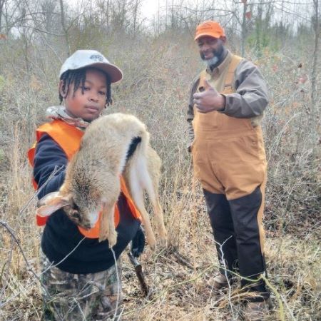 EJ at 11-year-old after a successful 2024 rabbit hunt.