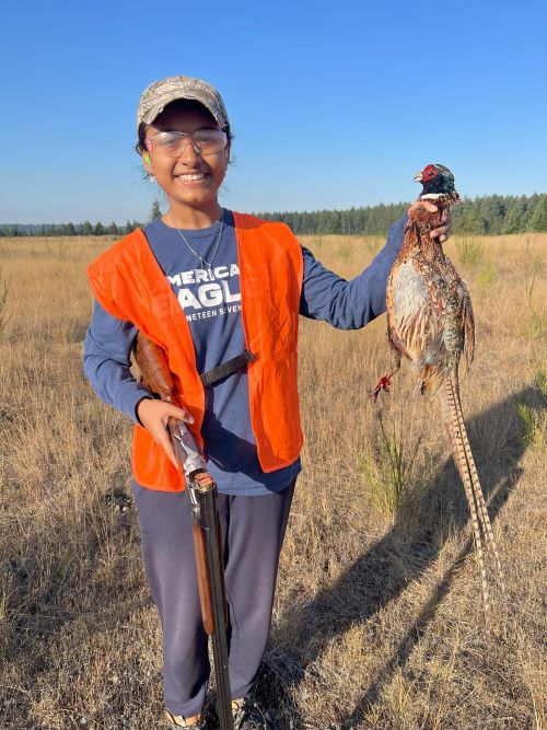 Yuthica Manney showing her first pheasant.